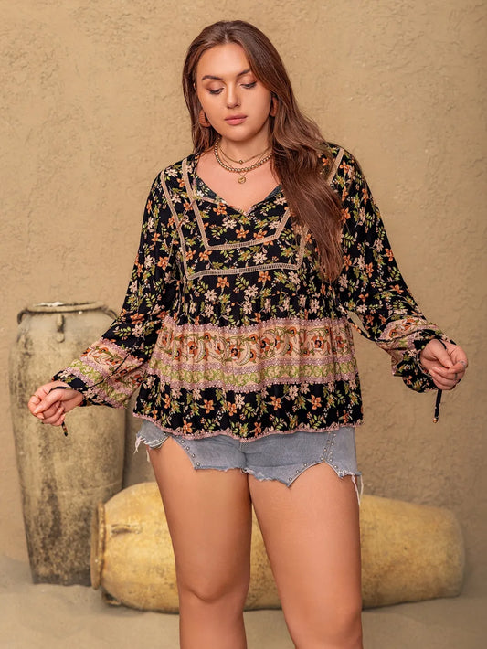 Plus Size Printed Tie Neck Balloon Sleeve Blouse - Premium Plus Size Shirts from Trendsi - Just $29.98! Shop now at Handbags Specialist Headquarter