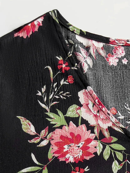 Plus Size Floral Flare Sleeve Dress - Premium Dresses from Trendsi - Just $53.99! Shop now at Handbags Specialist Headquarter