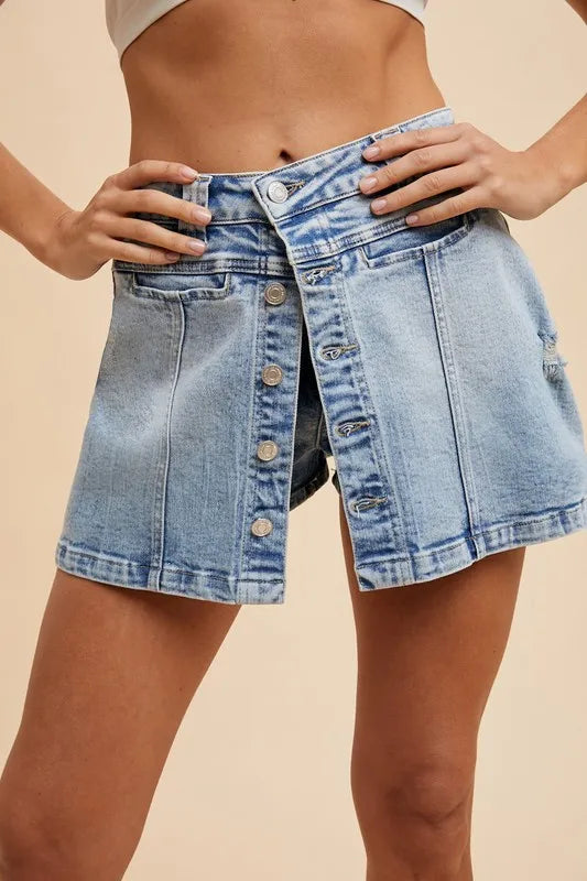 Annie Wear Button Detail Stretch Denim Wrap Mini Skort - Premium Skirts from Trendsi - Just $39.99! Shop now at Handbags Specialist Headquarter