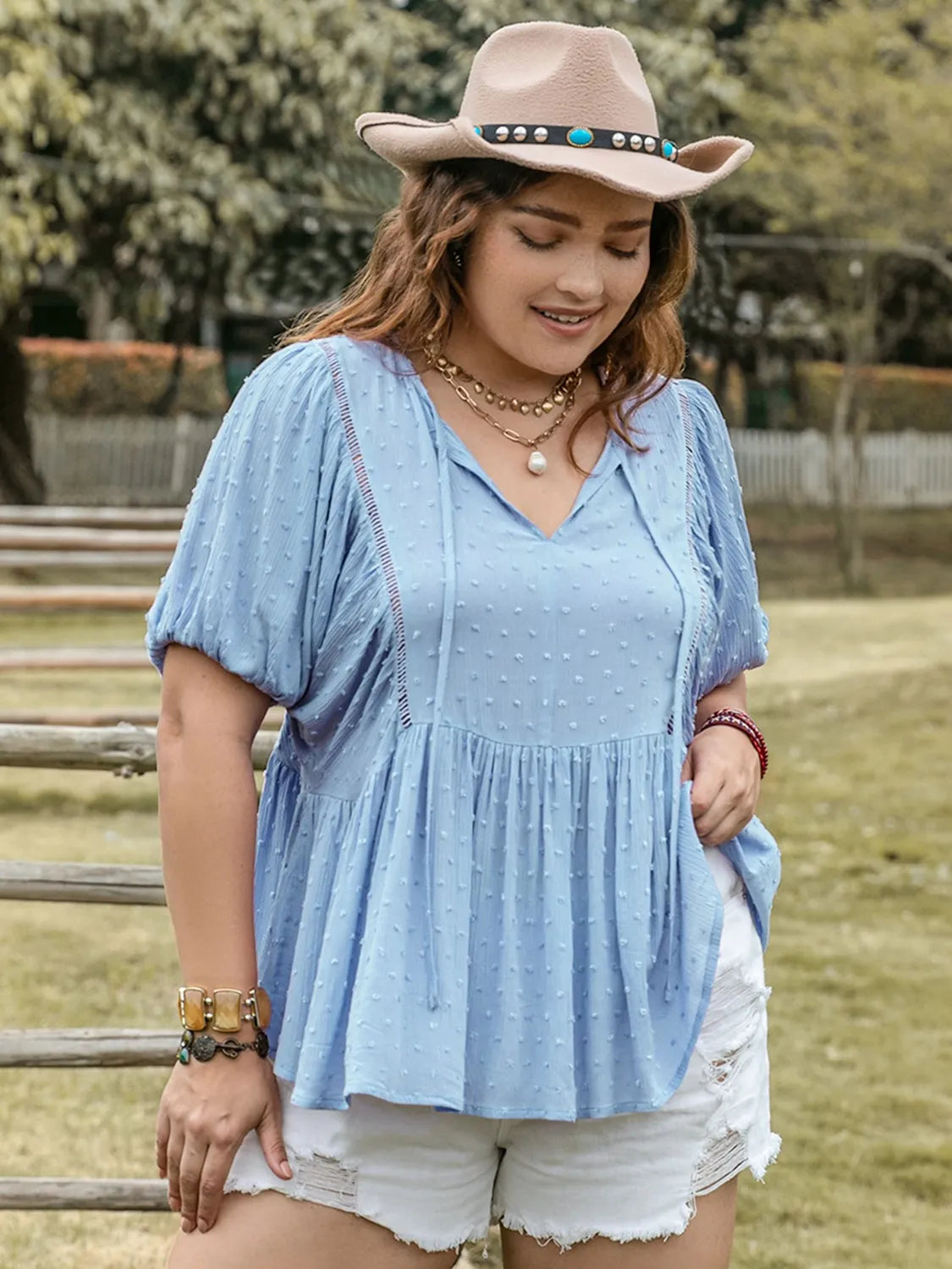 Plus Size Swiss Dot Tie Neck Short Sleeve Blouse - Premium Plus Size Shirts from Trendsi - Just $29.98! Shop now at Handbags Specialist Headquarter