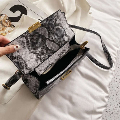 PU Leather Snakeskin Print Crossbody Bag - Premium Crossbody Bag from Trendsi - Just $35.99! Shop now at Handbags Specialist Headquarter