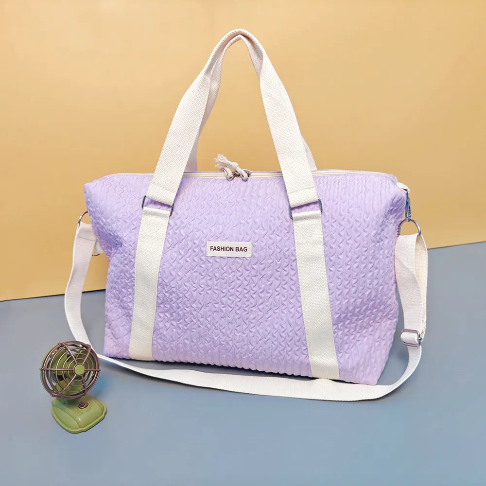 Textured Nylon Travel Bag - Premium travel-bag from Trendsi - Just $44.99! Shop now at Handbags Specialist Headquarter