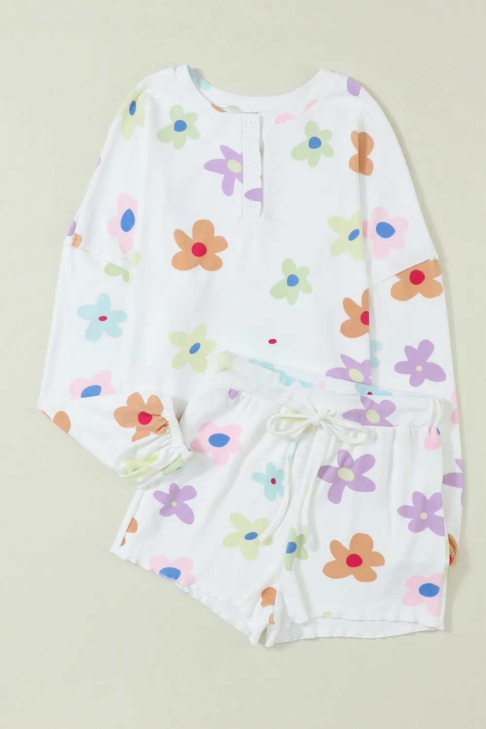 Printed Quarter Button Top and Drawstring Shorts Lounge Set - Premium Sleepwear from Trendsi - Just $43! Shop now at Handbags Specialist Headquarter