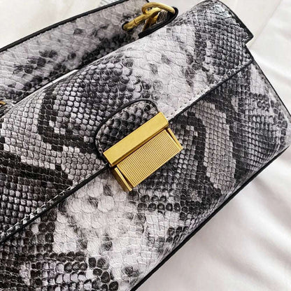 PU Leather Snakeskin Print Crossbody Bag - Premium Crossbody Bag from Trendsi - Just $35.99! Shop now at Handbags Specialist Headquarter
