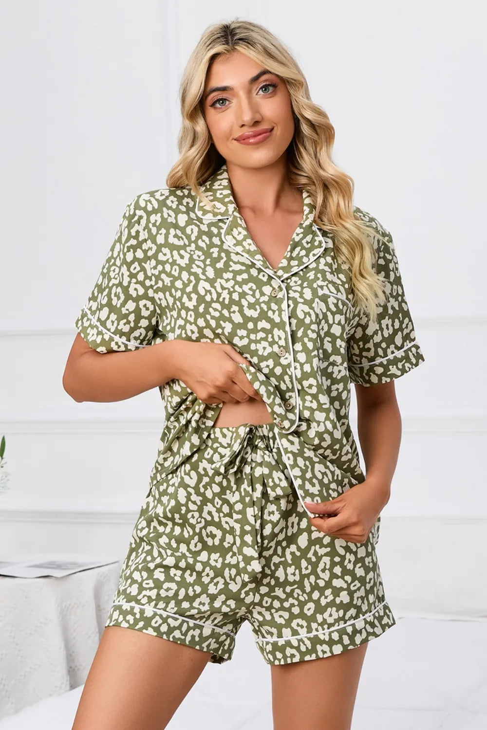 Full Size Leopard Short Sleeve Top and Shorts Lounge Set Plus Size - Premium Sleepwear from Trendsi - Just $26.76! Shop now at Handbags Specialist Headquarter