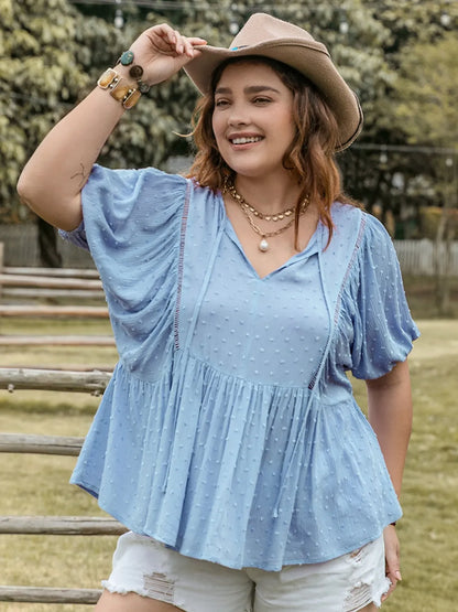 Plus Size Swiss Dot Tie Neck Short Sleeve Blouse - Premium Plus Size Shirts from Trendsi - Just $29.98! Shop now at Handbags Specialist Headquarter