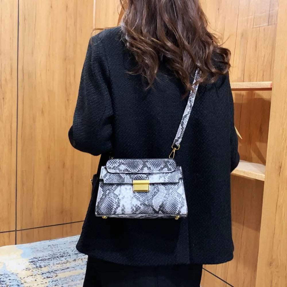 PU Leather Snakeskin Print Crossbody Bag - Premium Crossbody Bag from Trendsi - Just $35.99! Shop now at Handbags Specialist Headquarter