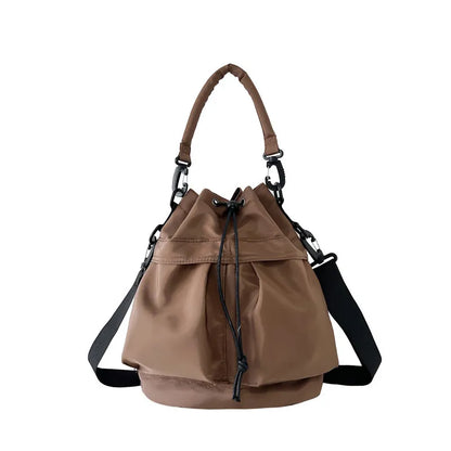 Drawstring Nylon Bucket Bag - Premium Crossbody Bag from Trendsi - Just $24.99! Shop now at Handbags Specialist Headquarter