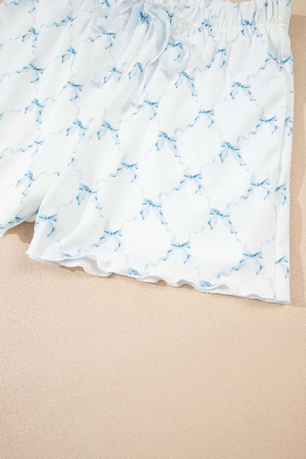 Printed Round Neck Top and Shorts Two-Piece Lounge Set - Premium Sleepwear from Trendsi - Just $39.99! Shop now at Handbags Specialist Headquarter