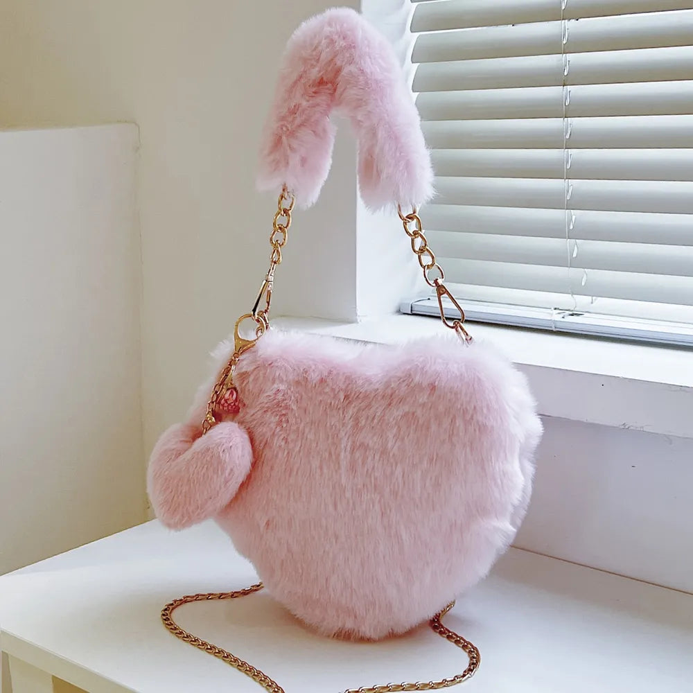 Heart Shape Faux Fur Handbag - Premium handbags from Trendsi - Just $19.99! Shop now at Handbags Specialist Headquarter