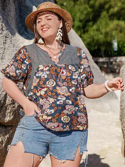 Plus Size Printed Notched Half Sleeve Blouse - Premium Plus Size Shirts from Trendsi - Just $23.26! Shop now at Handbags Specialist Headquarter