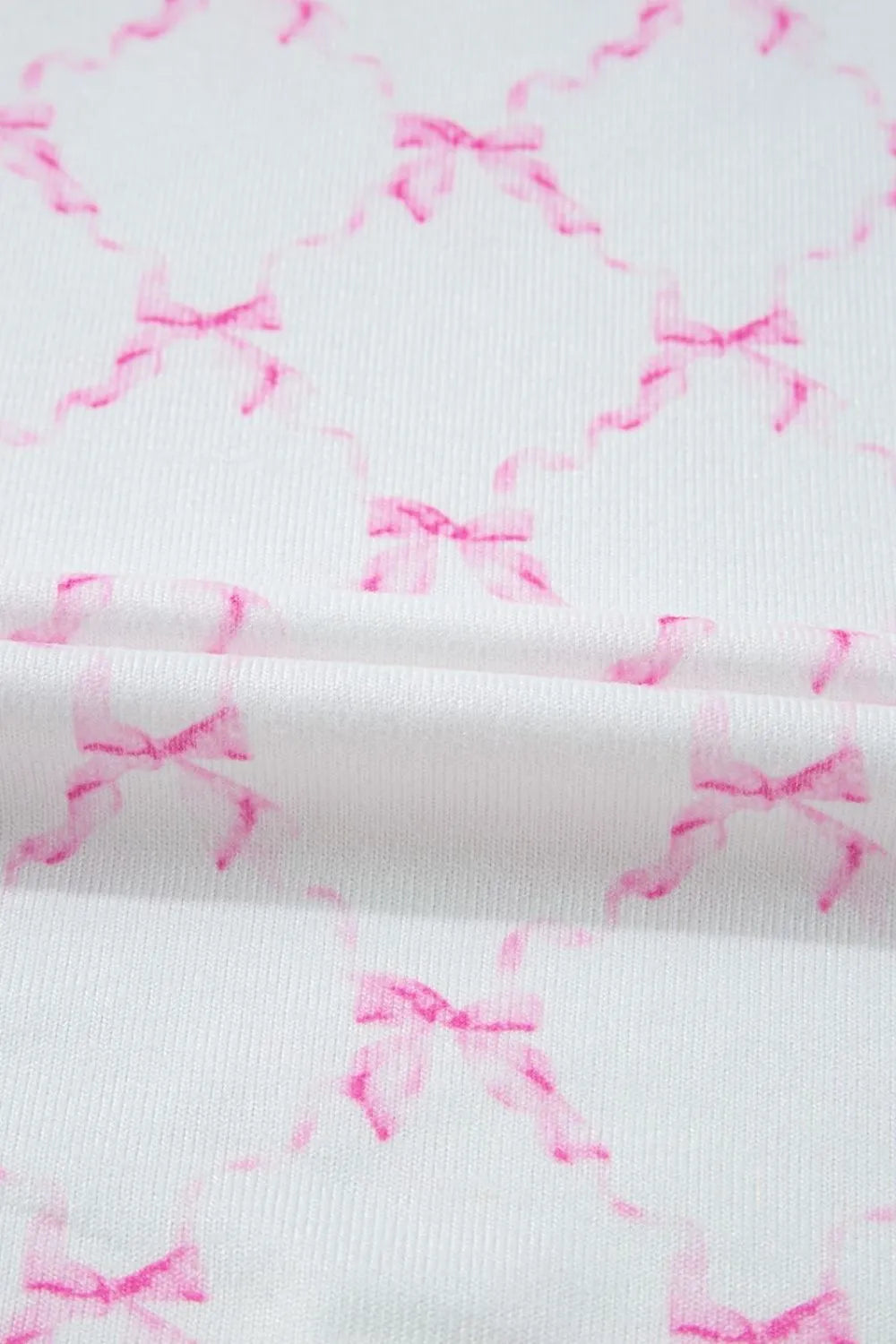 Bow Print Lettuce Trim Round Neck Top and Shorts Lounge Set - Premium Sleepwear from Trendsi - Just $32.14! Shop now at Handbags Specialist Headquarter