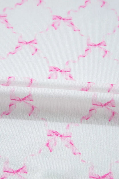 Bow Print Lettuce Trim Round Neck Top and Shorts Lounge Set - Premium Sleepwear from Trendsi - Just $32.14! Shop now at Handbags Specialist Headquarter