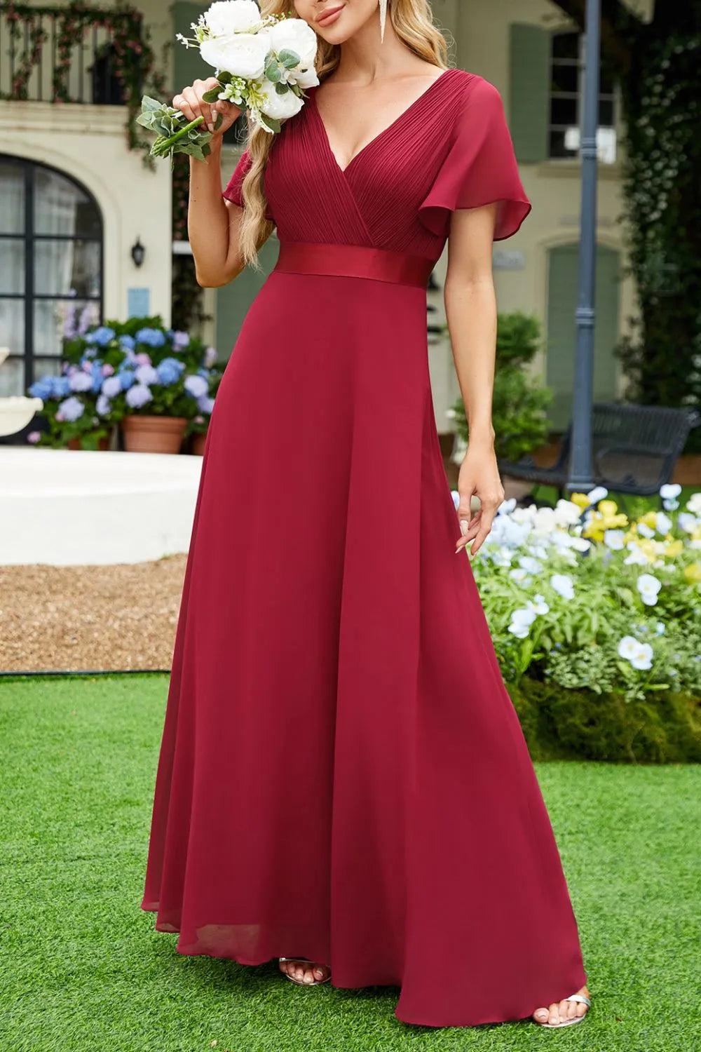 Surplice Flutter Sleeve Maxi Dress - Premium Maxi Dress from Trendsi - Just $40.99! Shop now at Handbags Specialist Headquarter