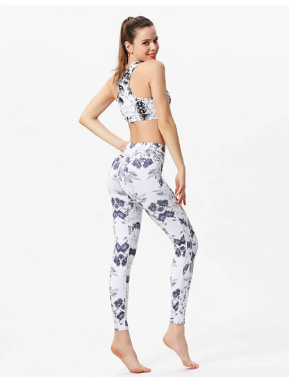 Printed Active High Waist Leggings - Premium Leggings from Trendsi - Just $48.12! Shop now at Handbags Specialist Headquarter