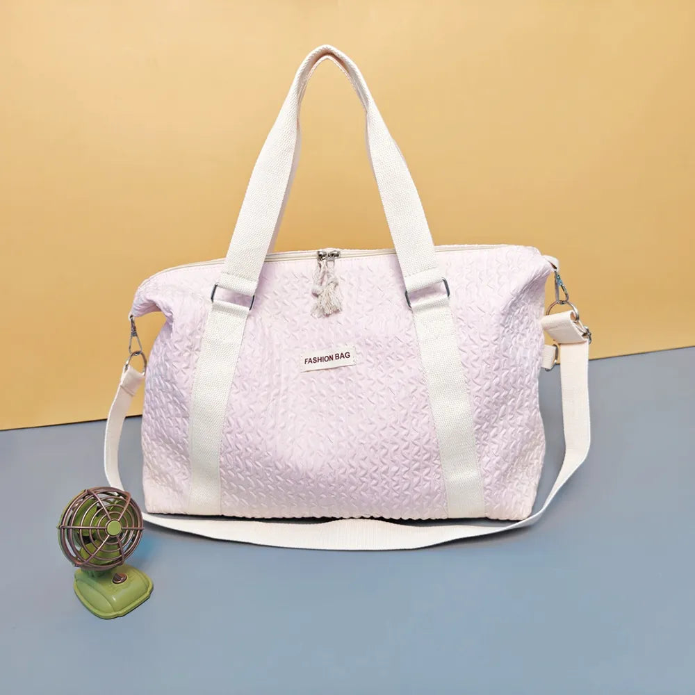 Textured Nylon Travel Bag - Premium travel-bag from Trendsi - Just $44.99! Shop now at Handbags Specialist Headquarter