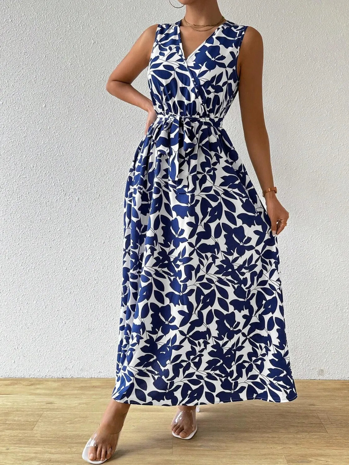 Printed Surplice Sleeveless Maxi Dress - Premium Maxi Dress from Trendsi - Just $43.99! Shop now at Handbags Specialist Headquarter