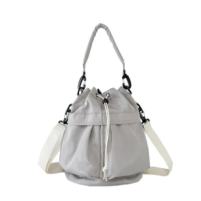 Drawstring Nylon Bucket Bag - Premium Crossbody Bag from Trendsi - Just $24.99! Shop now at Handbags Specialist Headquarter