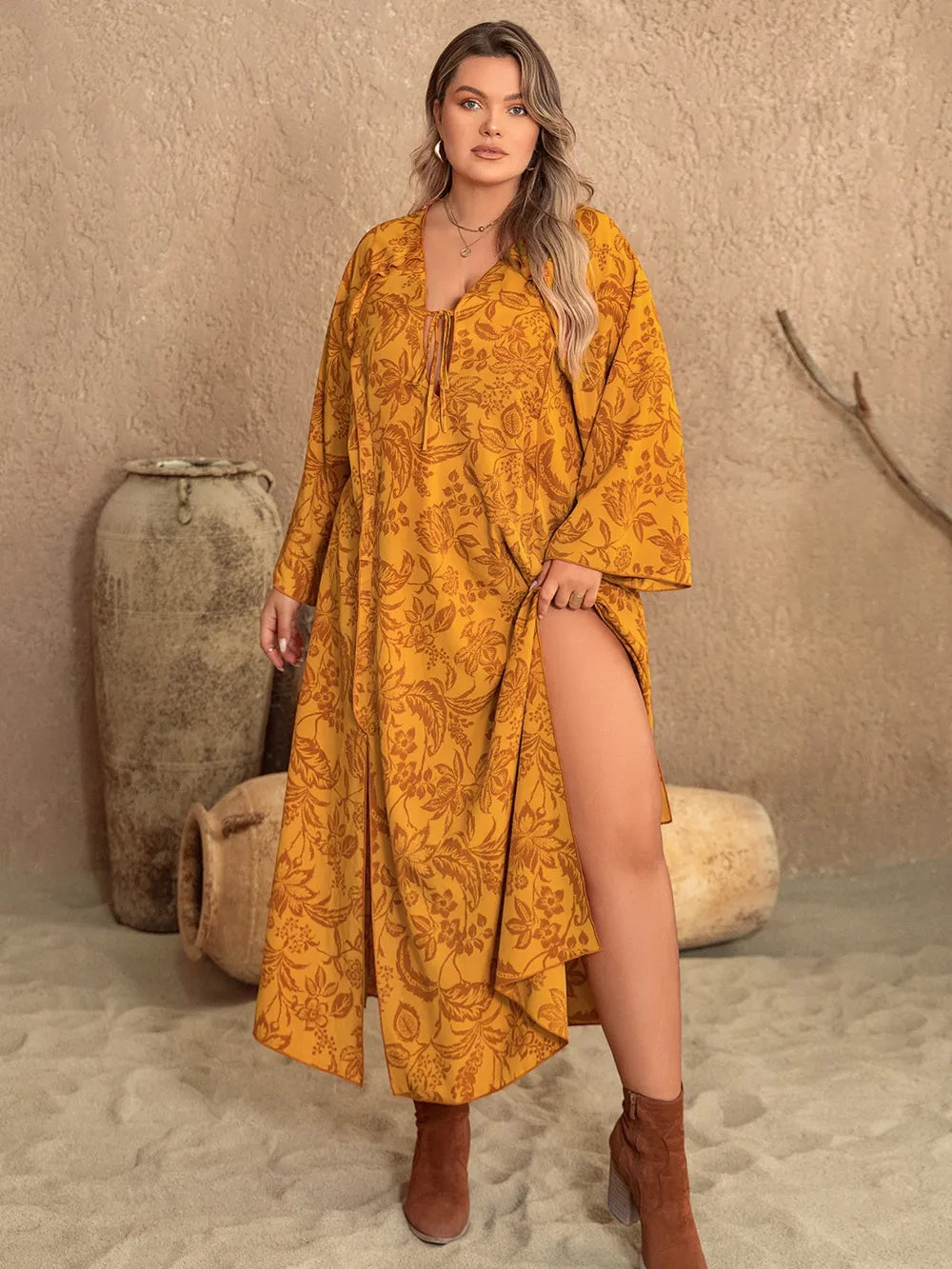 Plus Size Printed Slit Long Sleeve Dress - Premium Dresses from Trendsi - Just $41.99! Shop now at Handbags Specialist Headquarter