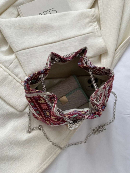 Printed Chain Bucket Bag - Premium Crossbody Bag from Trendsi - Just $19.99! Shop now at Handbags Specialist Headquarter