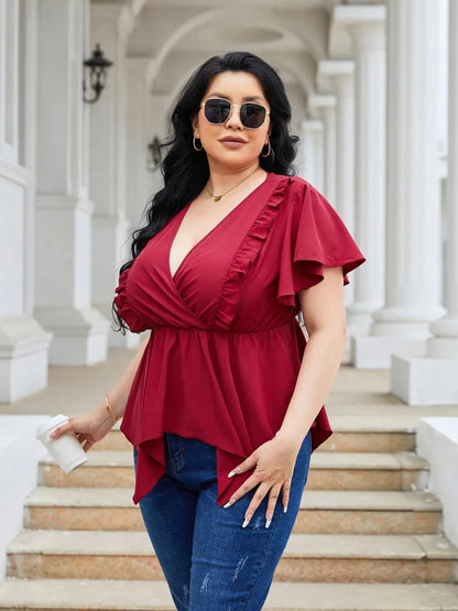 Plus Size Frill Surplice Flutter Sleeve Blouse - Premium Plus Size Shirts from Trendsi - Just $21! Shop now at Handbags Specialist Headquarter