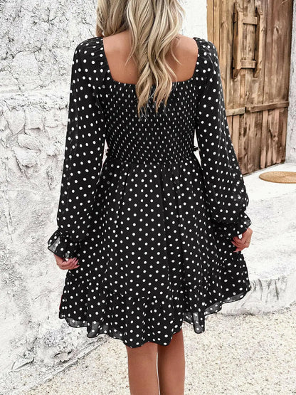 Smocked Polka Dot Long Sleeve Dress.